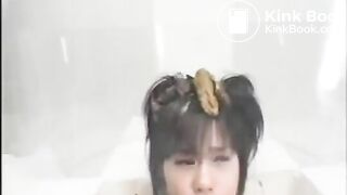 Japanese girls poop on their friends head