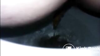 Girl shitting diarrhea in the toilet closeup