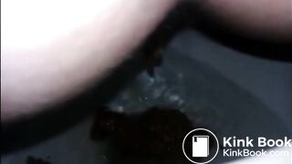 Girl shitting diarrhea in the toilet closeup