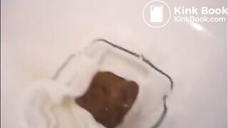 Girl shit and piss on white panty in the bathtub