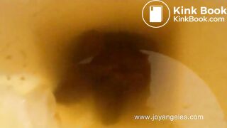 Soft poop from attractive brunette