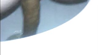 Woman shitting a long turd very slowly in the toilet