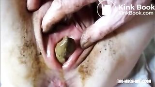 Dirty lady eject a piece of shit from her cunt