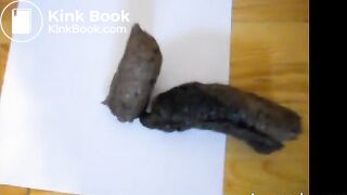 Dildoing out her poop