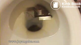 Mila Perlman  poops by side of bath