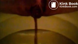 Girl shitting in the toilet and inserting dildo on her asshole