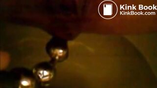 Girl shitting in the toilet and inserting dildo on her asshole