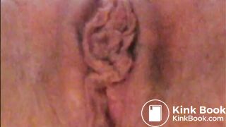 Mature lady masturbating with brush and shitting
