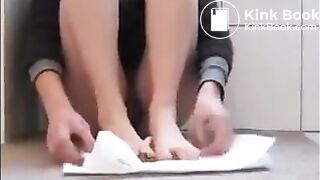 Girl shitting and put her feet on it
