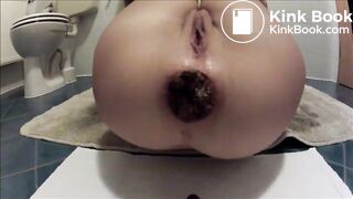 This girl is doing a very large turd of shit