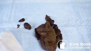 Pooping from a locker room bench