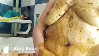 Woman is smearing shit on her breast