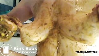 Woman is smearing shit on her breast