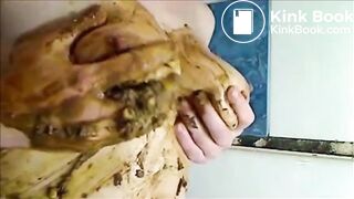 Woman is smearing shit on her breast