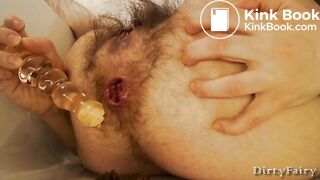 Hairy lady's shitty anal dildo play