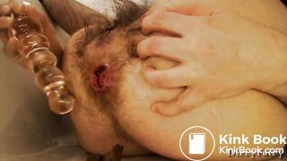 Hairy lady's shitty anal dildo play