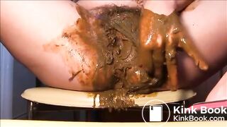 Woman fisting herself with a lot of shit