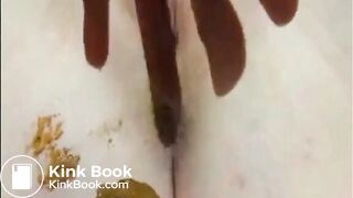 Shaved girl shitting closeup and fingering her pussy