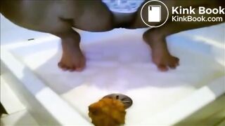 Ebony teen smearing shit on her feet