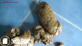 Mia close up poop in bathroom