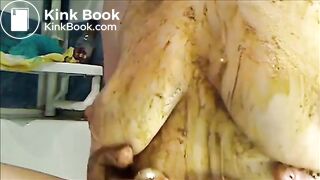 Mature woman smearing shit on her tits