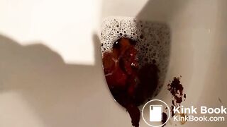 Blonde drops very fat turd in the toilet