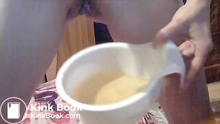 Indian lady drops hard poops into a glass