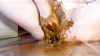 Girl masturbating and fisting her pussy with shit