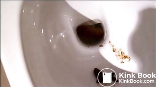 Big poop squatting over the bowl