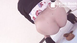 Pretty Asian girl's big poop