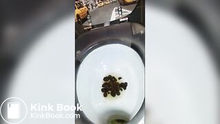 Dropping hard lumps into the toilet bowl