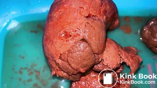 Blonde's giant poo into a wash bowl