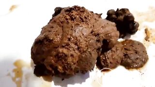 Blonde poops a huge shit in the bath