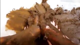 Girl shitting throug the blue jeans and tramples with her feet