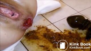 Anal fisted girl shitting and squirting