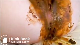 Girl masturbation and fisting while shitting