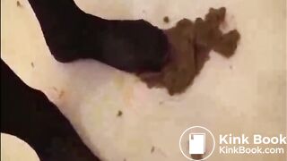 Babe shitting in the bathroom and put her nylon feet on it