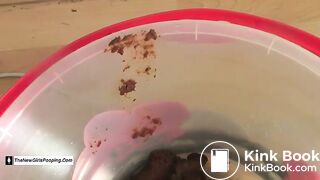 Pauline shits two days' worth of poop into a bucket