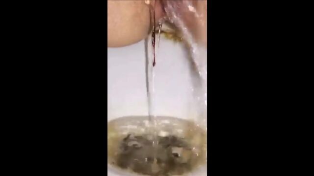Girl on her period shitting in the toilet