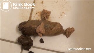 Tegan's anus expands to release a beautiful thick log