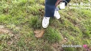 Sophie poops in a field
