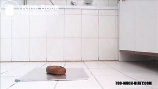 Babe shitting a long turd on the floor