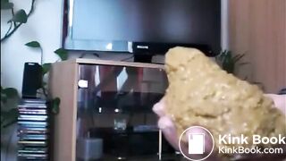 Girl shitting big pile on her hand