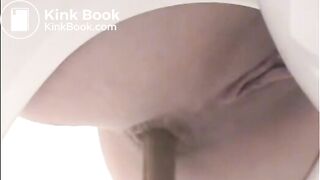 Girl shitting a lot in the toilet closeup