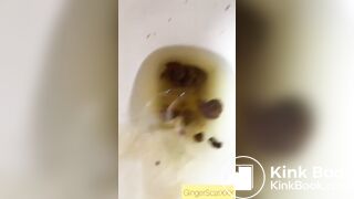 Relieving herself of a hard poop