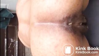 Hairy woman shitting doggystyle closeup