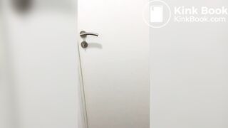 Big poop on the floor of a hospital toilet