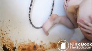 Young girl shitting a very liquid diarrhea in the bathtub -