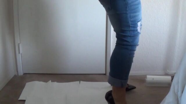 Blonde in jeans and heels shitting