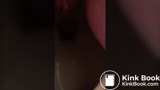 Sweet redhead girl shitting in the toilet